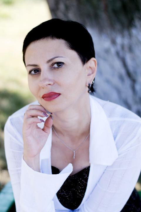 Oksana sucht einen Partner über die Partnervermittlung Ukraine Foto von Oksana, einer Frau aus der Ukraine auf Partnersuche