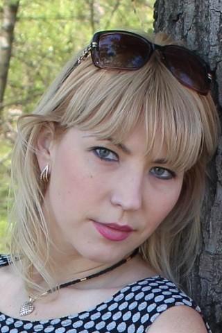 Oksana sucht einen Partner über die Partnervermittlung Ukraine Foto von Oksana, einer Frau aus der Ukraine auf Partnersuche